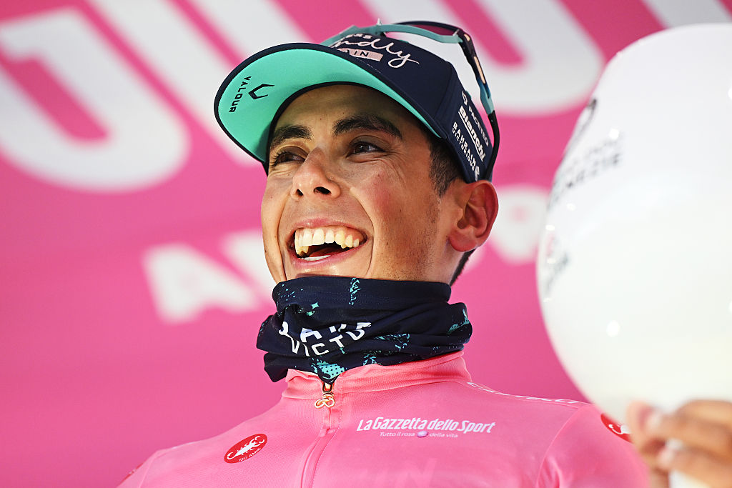 Afonso Eulalio of Portugal and Team Bahrain - Victorious celebrates at podium as Pink Leader Jersey winner during the 109th Giro d'Italia