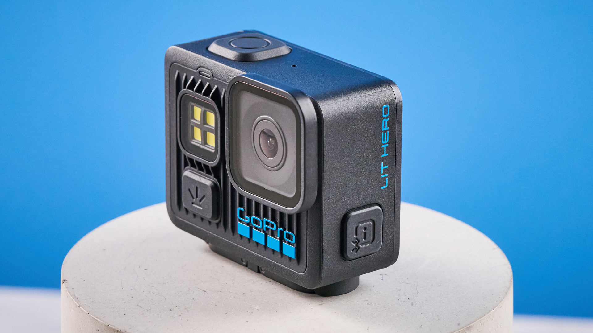 The GoPro LIT Hero against a blue background