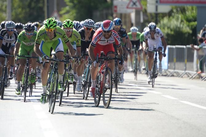 Luca Paolini brings up Kristoff next to the Cannondale train
