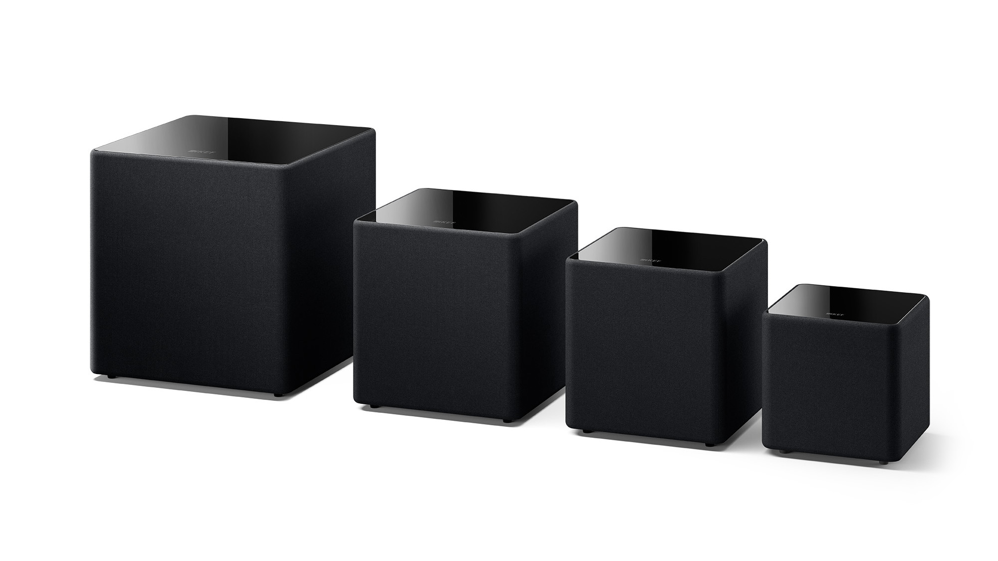 KEF KUBE MIE subwoofer lineup on a white background