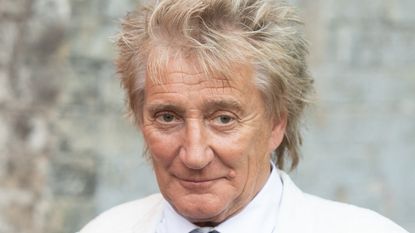 Rod Stewart filling potholes