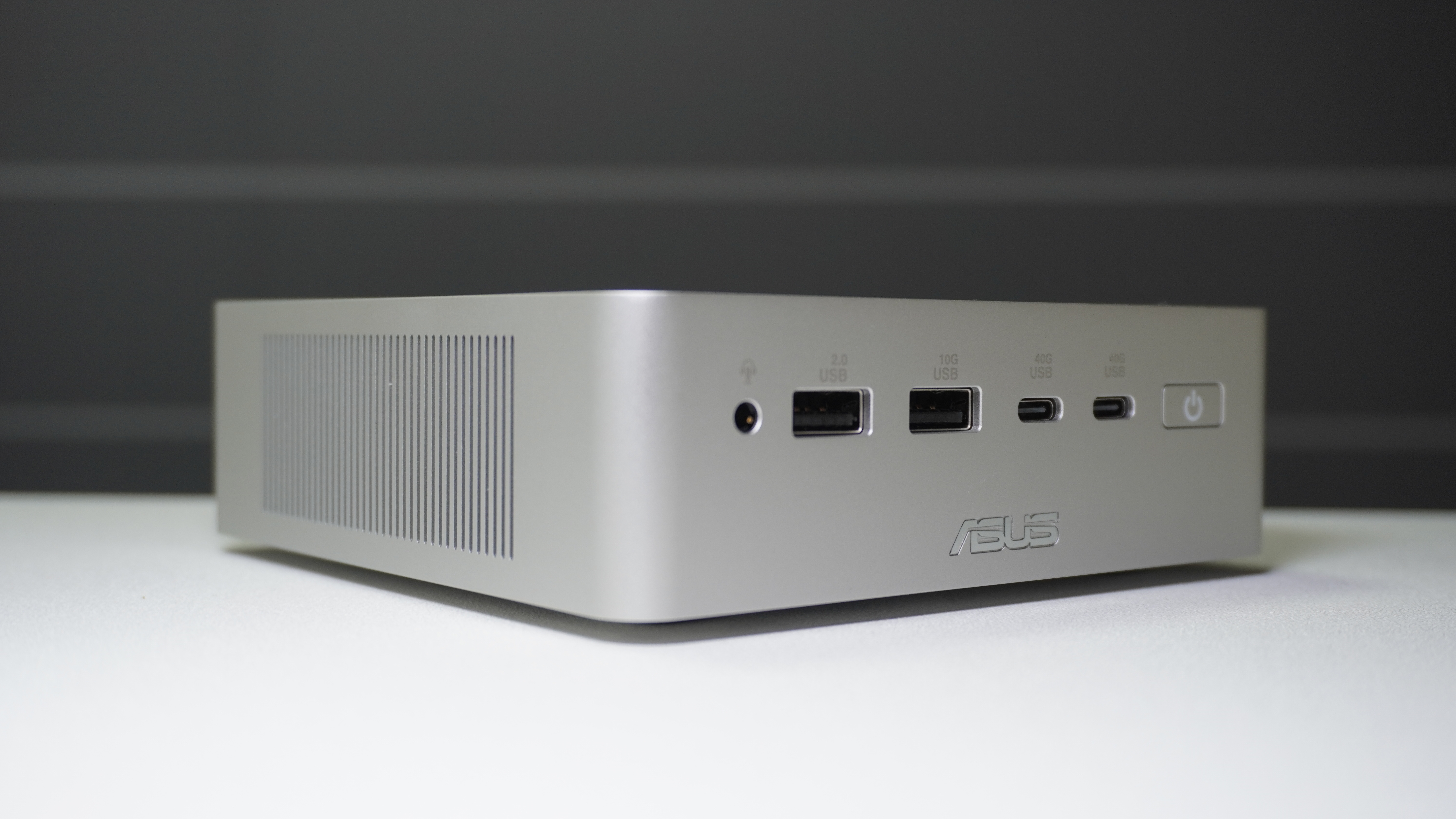 The Asus Ascent QN10 mini PC on a table