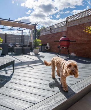 grey deck with pergola and bbq
