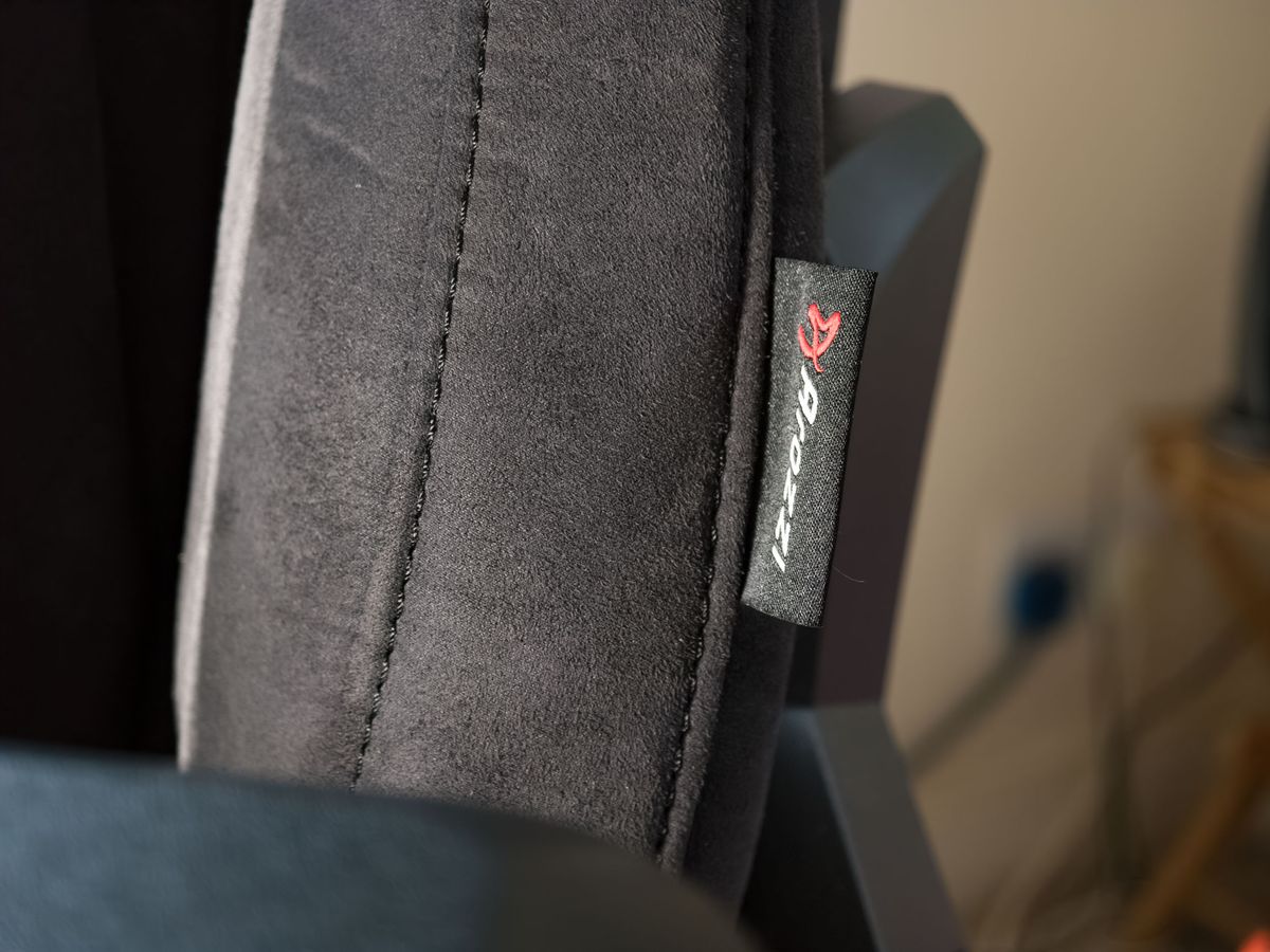 Closeup of the Arozzi Vernazza Supersoft gaming chair's brand label