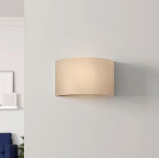 Japandi style wall light in neutral beige fabric with dimmer control for ambient lighting