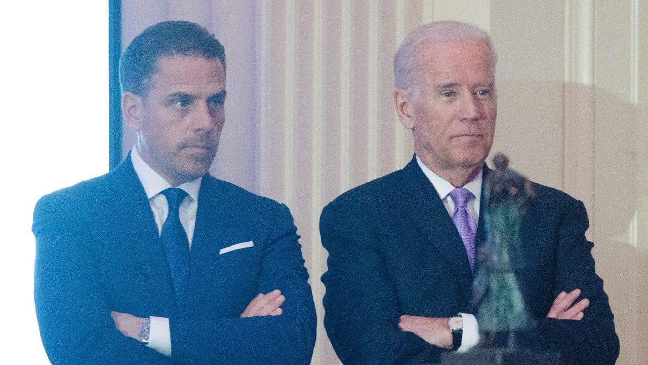 Hunter standing with Joe Biden