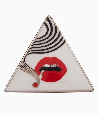 Triangular jewellery box with the image of a mouth smoking a cigarette
