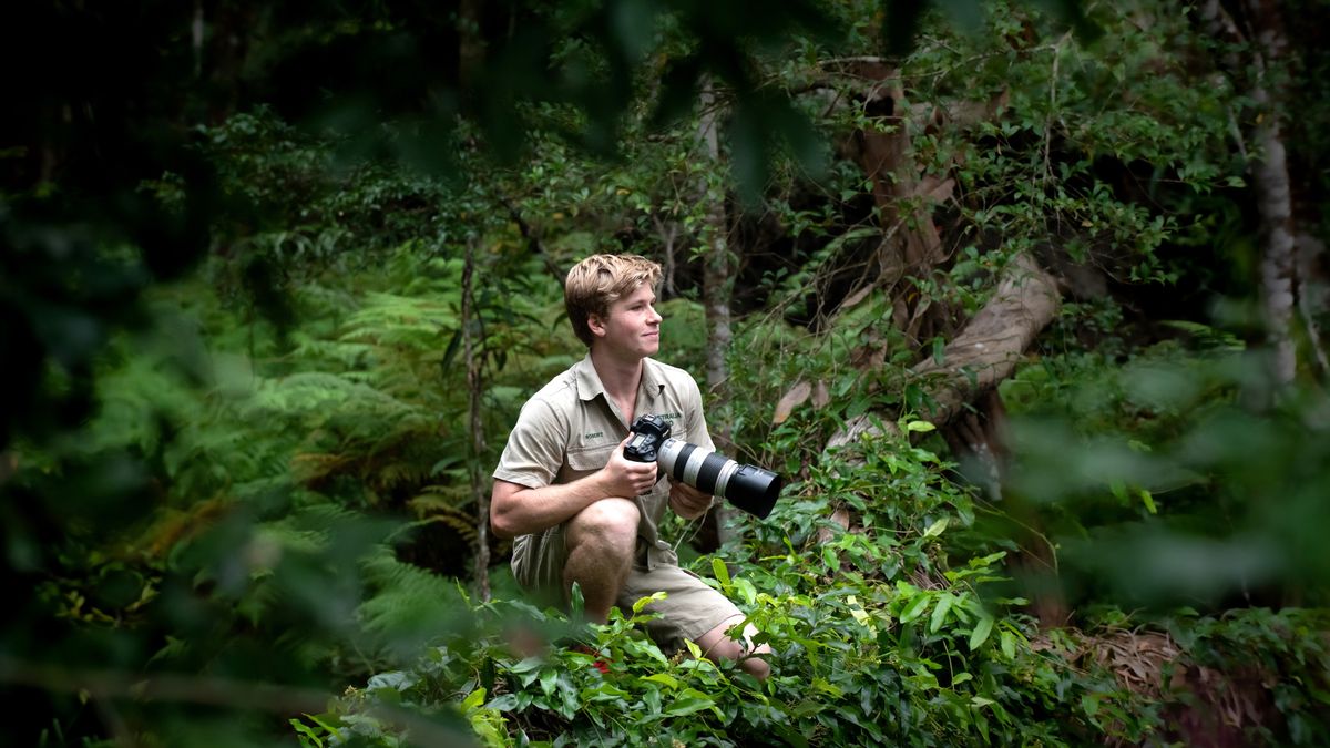 Rob Irwin holding his camera