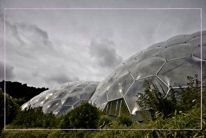 The Eden Project in Cornwall with rain clouds above