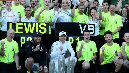 The Mercedes team and drivers celebrate the victory at the 2019 F1 Azerbaijan GP in Baku 