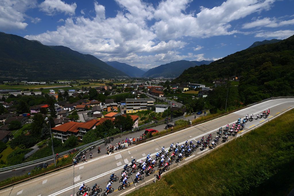 NOVAZZANO SWITZERLAND JUNE 16 A general view of the peloton passing through Monte Ceneri 556m during the 85th Tour de Suisse 2022 Stage 5 a 1901km stage from Ambri to Novazzano 364m ourdesuisse2022 WorldTour on June 16 2022 in Novazzano Switzerland Photo by Tim de WaeleGetty Images