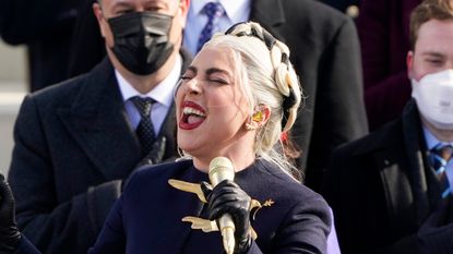 US singer Lady Gaga sings the National Anthem for the inauguration of Joe Biden as the 46th US President on January 20, 2021, at the US Capitol in Washington, DC