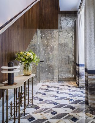Lucurious entryway with geometric marble floor