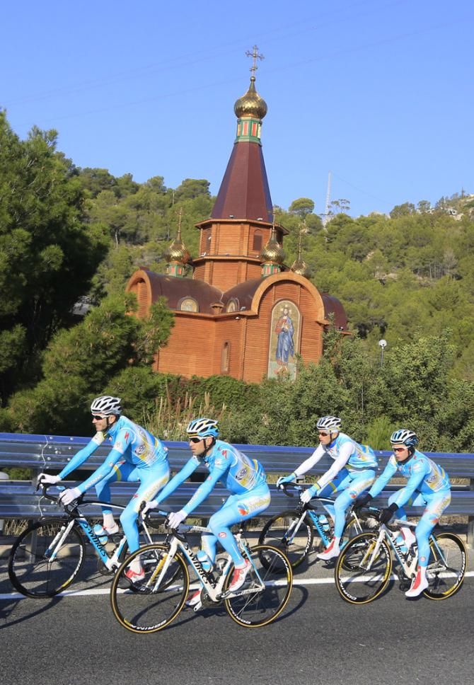 Astana pass a local landmark while out training