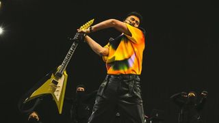 AP Dhillon smashing his guitar on stage at Coachella