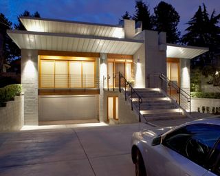 front garden lighting design with house and driveway