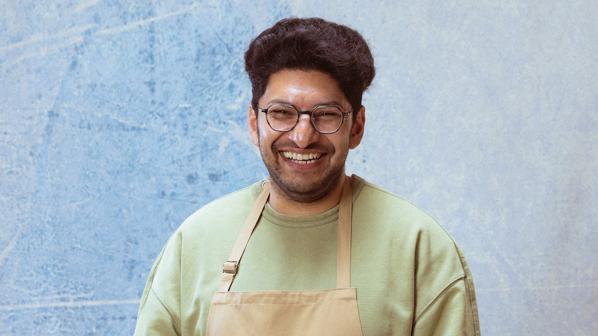 &quot;The Great British Baking Show&quot; 2025 contestant headshot of Hassan