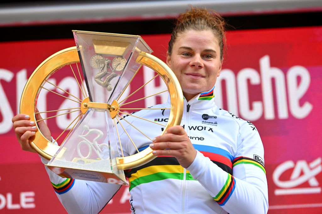 SIENA ITALY MARCH 02 Lotte Kopecky of Belgium and Team SD WorxProtime celebrates at podium as race winner during the 10th Strade Bianche 2024 Womens Elite a 137km one day race from Siena to Siena 320m UCIWWT on March 02 2024 in Siena Italy Photo by Luc ClaessenGetty Images