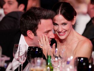 Jennifer Garner holding Ben Affleck's face at the 2011 Critics' Choice Movie Awards