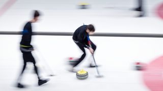 People trying curling, a great alternative workout