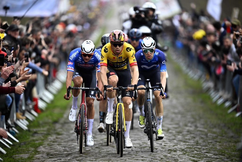 Dutch Mathieu van der Poel of AlpecinDeceuninck Belgian Wout van Aert of Team JumboVisma and German Juri Hollmann of Movistar Team pictured in action during pictured at the Trouee dArenberg cobbled road passage during the mens elite race of the ParisRoubaix cycling event 2566km from Compiegne to Roubaix France on Sunday 09 April 2023 BELGA PHOTO JASPER JACOBS Photo by JASPER JACOBS BELGA MAG Belga via AFP Photo by JASPER JACOBSBELGA MAGAFP via Getty Images