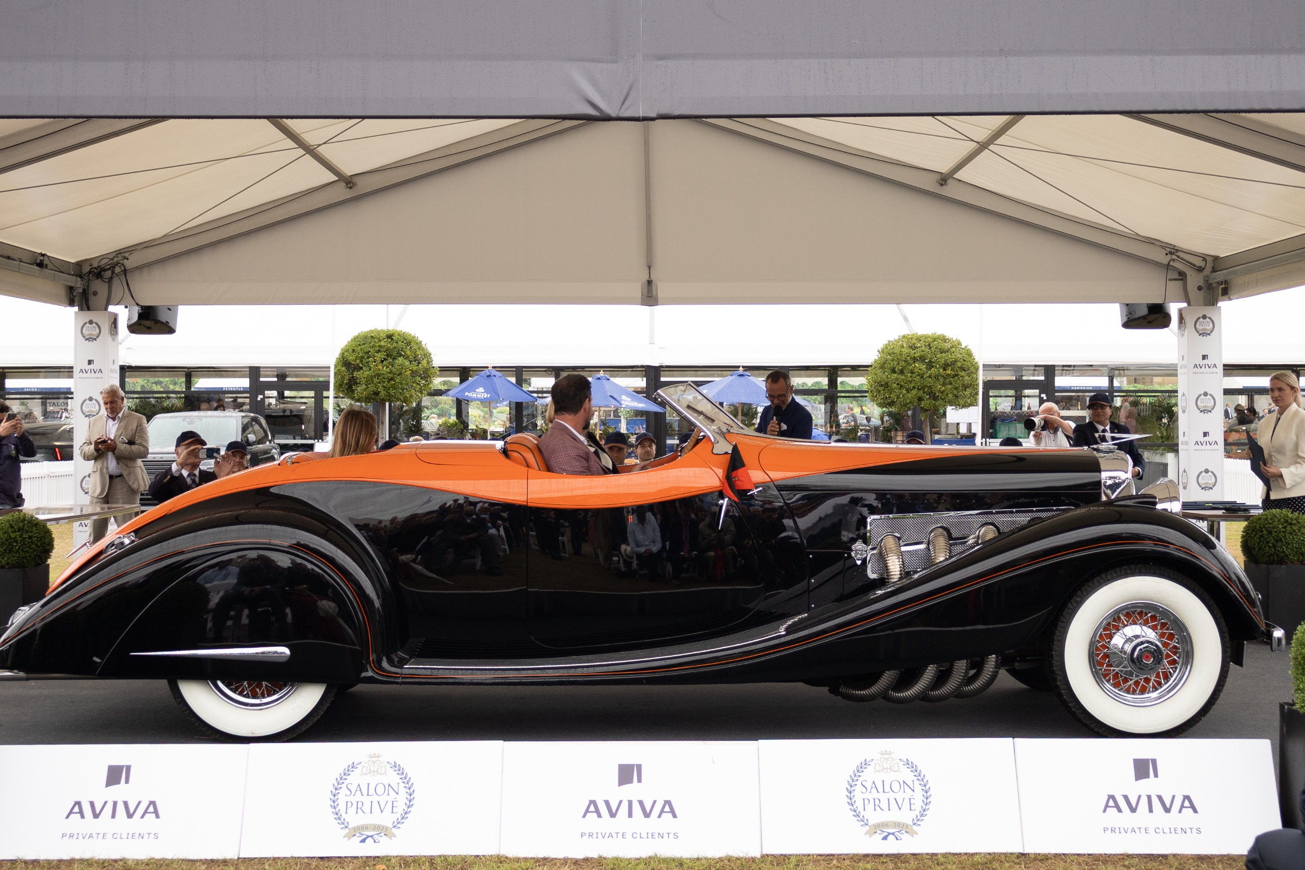 The Duesenberg viewed from the side, showing its immense size