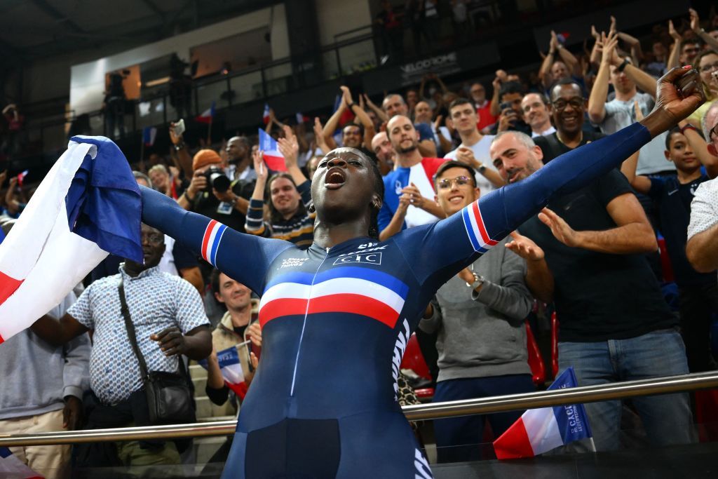Frances Taky Marie Divine Kouame celebrates her victory after winning the Womens 500m time trial final during the UCI Track Cycling World Championships at the Velodrome of SaintQuentinenYvelines southwest of Paris on October 15 2022 Photo by AnneChristine POUJOULAT AFP Photo by ANNECHRISTINE POUJOULATAFP via Getty Images