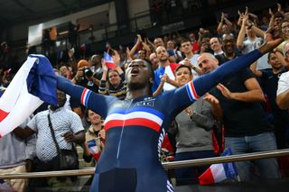 Frances' Taky Marie Divine Kouame celebrates her victory after winning the Women's 500m time trial final during the UCI Track Cycling World Championships