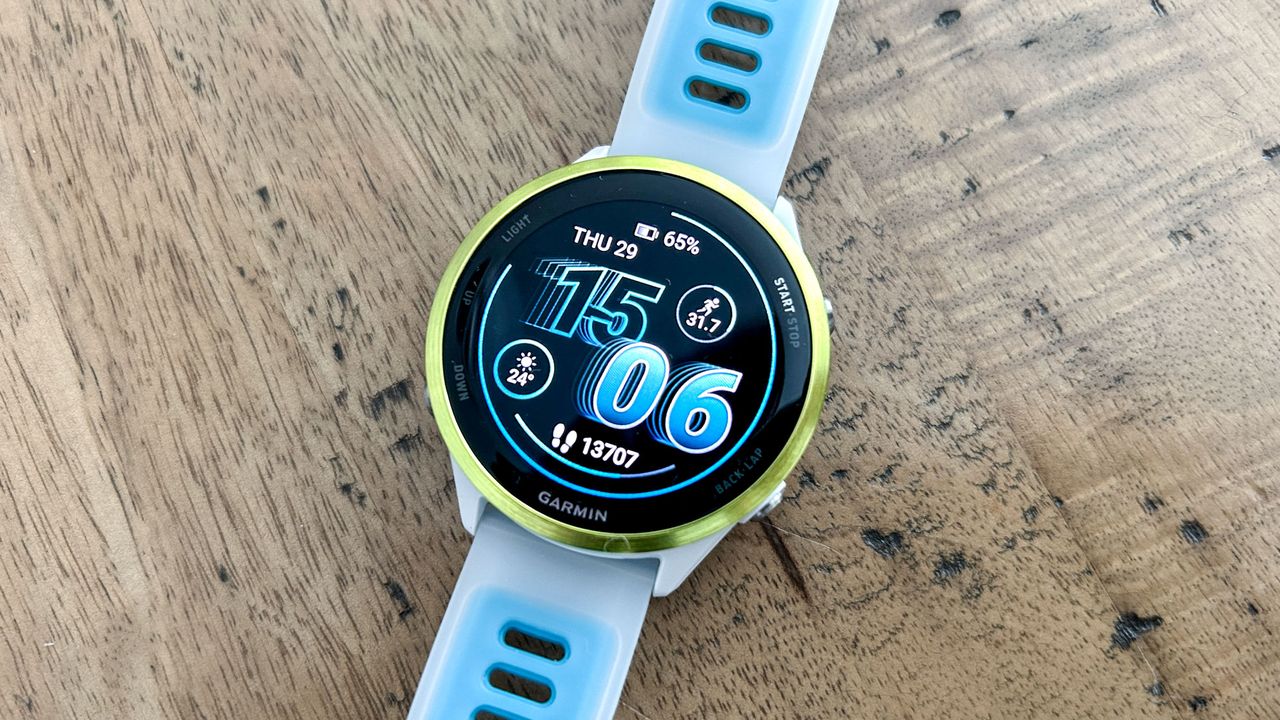 Garmin Forerunner 570 on a wooden table