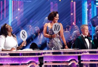 Shirley Ballasin a silver dress holding a number 10 paddle in her judges seat for Strictly Come Dancing 2023