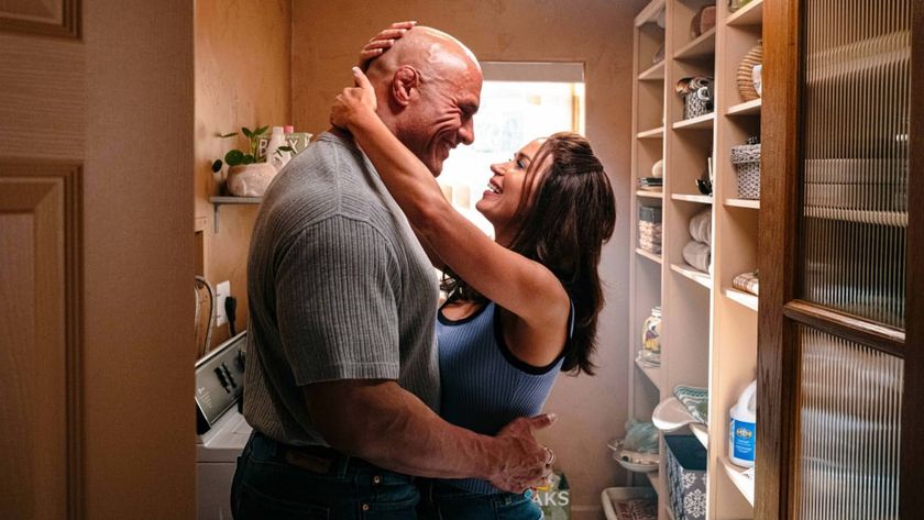 Mark Kerr (Dwayne Johnson) and Dawn Staples (Emily Blunt) locked in an embrace in The Smashing Machine