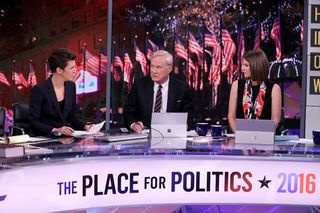 Chris Matthews (c.) on set on Election Night 2020 with colleagues Rachel Maddow (l.) and Kasie Hunt. 