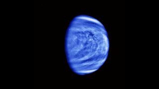 Venus as seen by the Galileo spacecraft on Feb. 14, 1990. This image has been colorized with a blue hue to note cloud details.