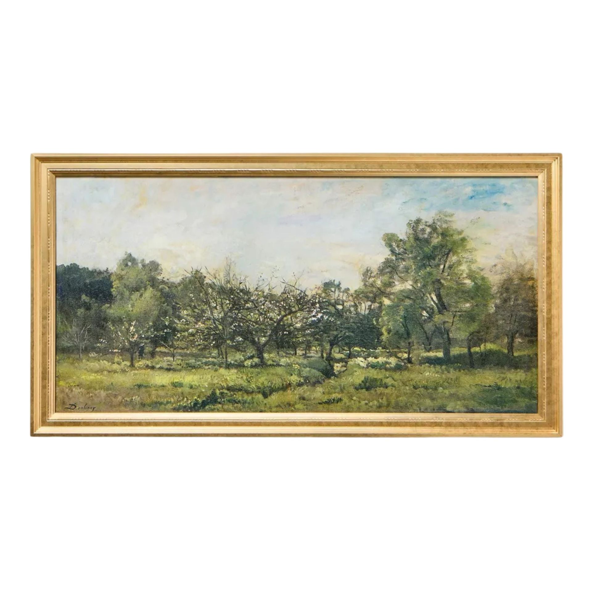 A landscape print in gold frame