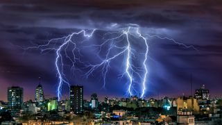 How to photograph lightning - Lightning bolts over Buenos Aires, Argentina. Nikon D5000 DSLR with 18-55mm. 15 secs at f/8, ISO200.