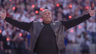 Dr. Dre arms outstretched at Super Bowl LVI