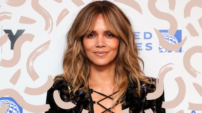 Halle Berry showing how to style layered hair with a choppy centre parted layered style