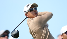Sadom Kaewkanjana hits a tee shot with a driver