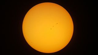 Before the solar eclipse, the sun showed off some sweet sunspots this morning (Aug. 21).