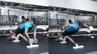 Man performs reverse flye with dumbbells lying chest down on an incline bench