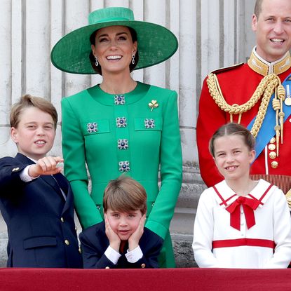 Prince George, Prince Louis, and Princess Charlotte pose on the Buckingham Palace balcony