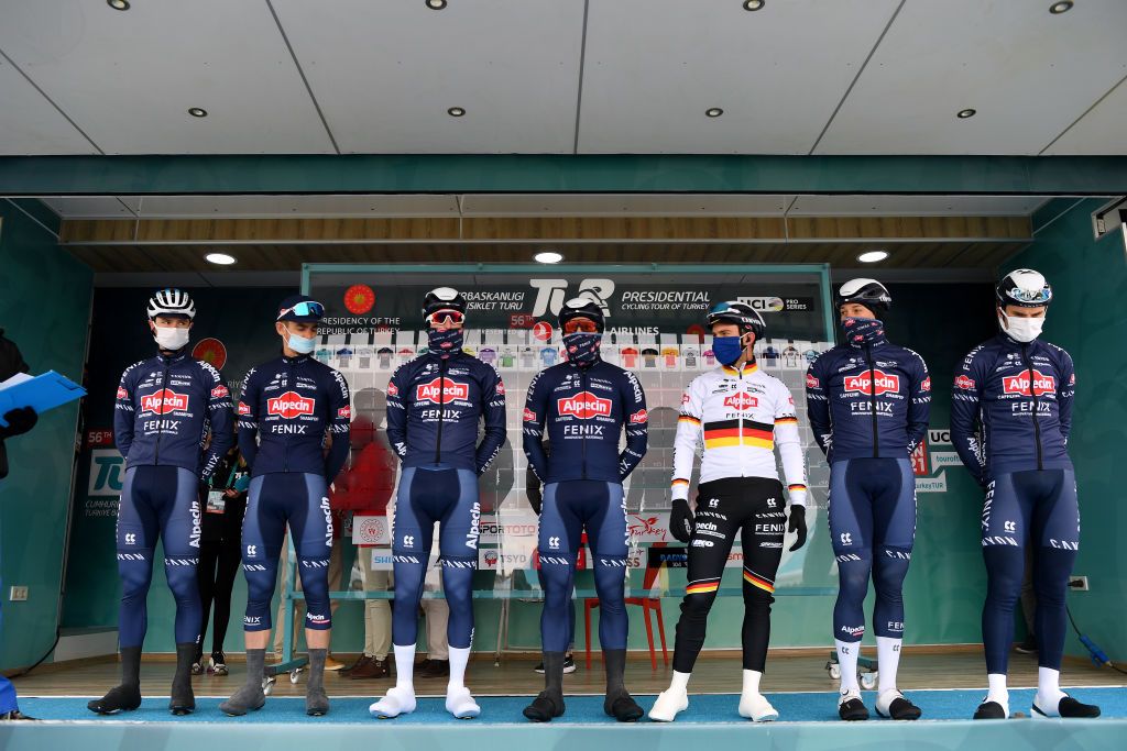 KONYA TURKEY APRIL 11 Start Podium Jasper Philipsen of Belgium Alexandar Richardson of United Kingdom Marcel Meisen of Germany Jay Vine of Australia Lionel Taminiaux of Belgium Alexander Krieger of Germany Sacha Modolo of Italy and Team AlpecinFenix during the 56th Presidential Cycling Tour Of Turkey 2021 Stage 1 a 724km stage from Konya to Konya 1030m Route modified due to snow on the original itinerary TUR2021 tourofturkeyTUR on April 11 2021 in Konya Turkey Photo by Stuart FranklinGetty Images