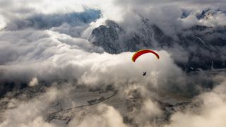 what is paralpinism: paraglider in the Alps