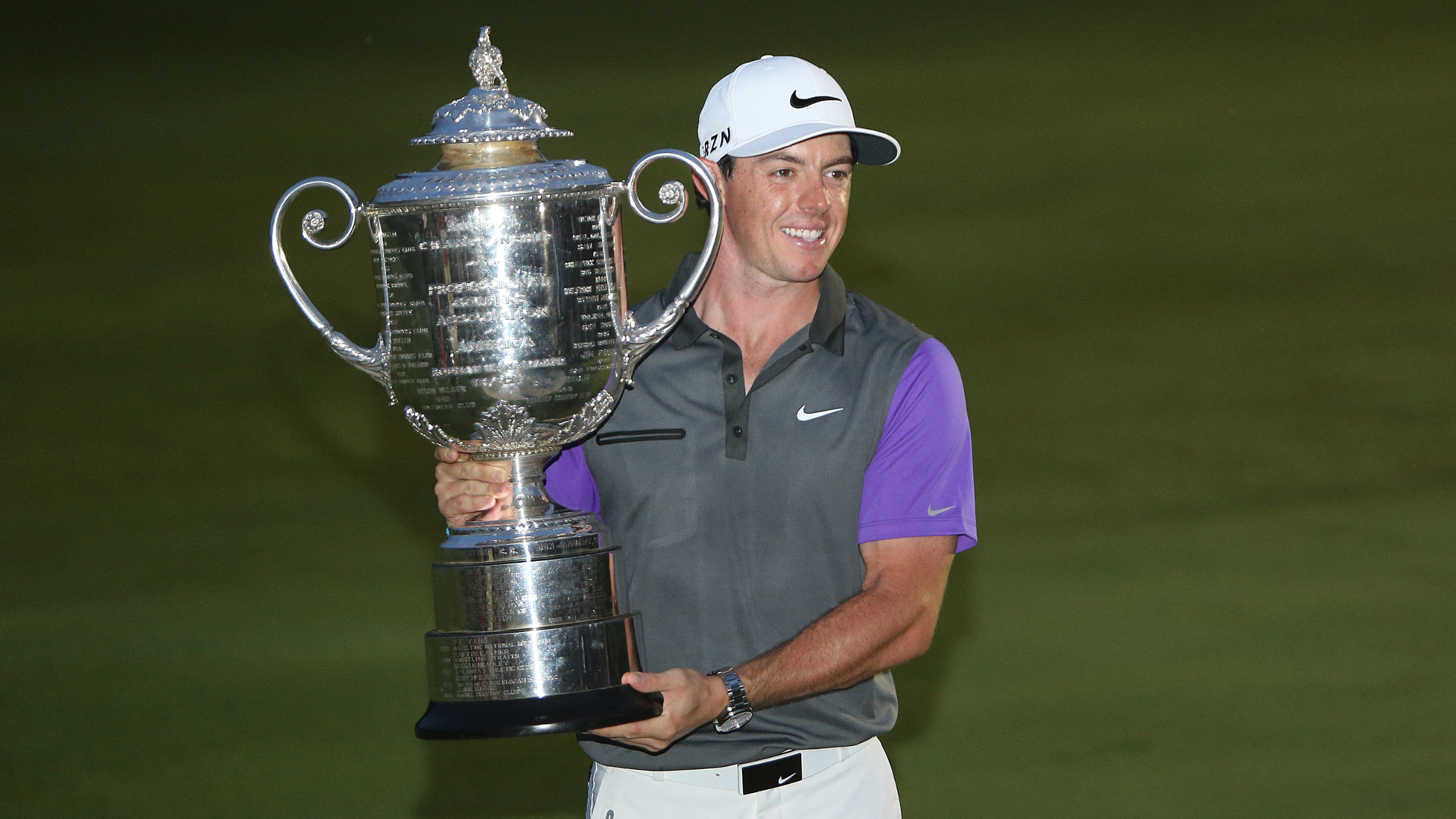 Rory McIlroy holding the PGA Championship trophy