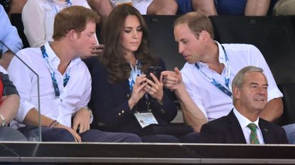Kate, William & Harry Looking at Phone