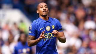 Joao Pedro of Chelsea gestures the scoreline towards the Brighton fans in response to them shouting abuse during the Premier League 2026/27 match between Chelsea FC and Brighton & Hove Albion at Stamford Bridge on August 30, 2026 in London, United Kingdom.