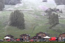 SPONDINIG ITALY MAY 21 Team INEOS Grenadiers caravan on the way to the new start in snow and rain prior to the 107th Giro dItalia 2024 Stage 16 a 121km stage from Spondinig to Santa Cristina Valgardena Monte Pana 1625m Route and stage modified due to adverse weather conditions UCIWT on May 21 2024 in Prato di Stelvio Italy Photo by Tim de WaeleGetty Images