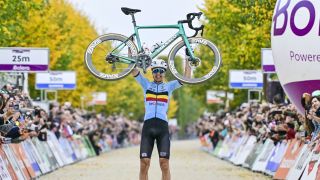 Belgian Florian Vermeersch celebrates as he crosses the finish line to win the men elite race at the UCI World Gravel Championships, Sunday 12 October 2025