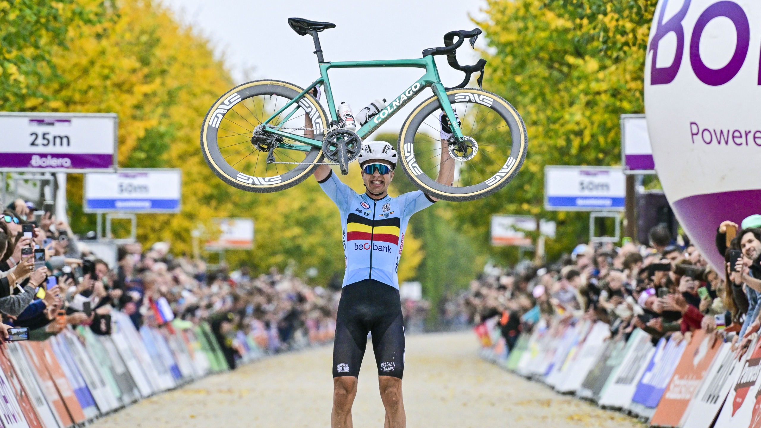 Belgian Florian Vermeersch celebrates as he crosses the finish line to win the men elite race at the UCI World Gravel Championships, Sunday 12 October 2025