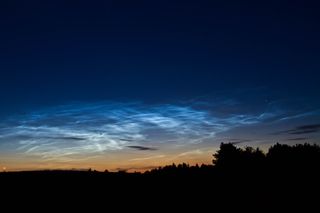 Night-shining clouds, or noctilucent clouds, photo from Denmark 